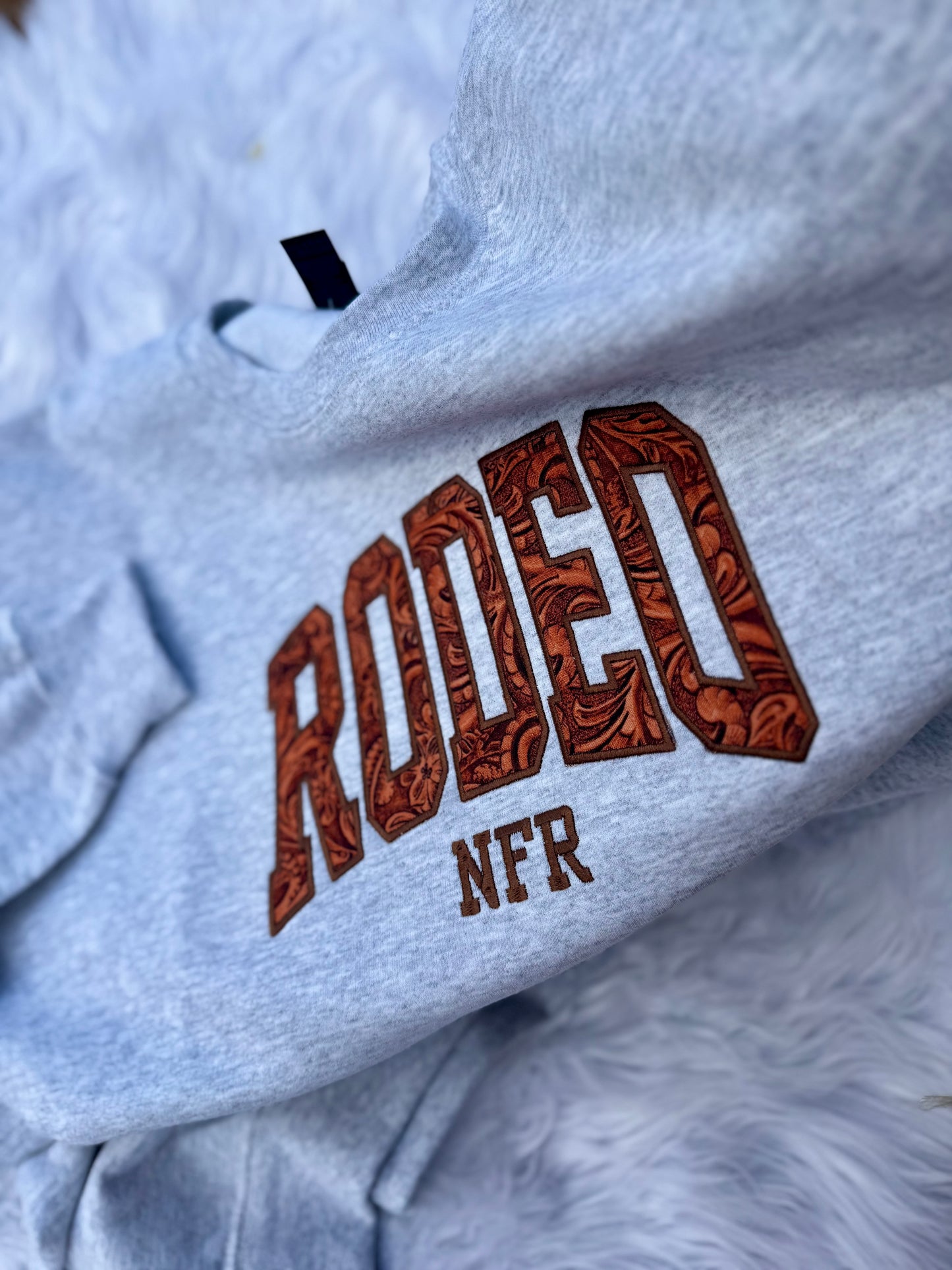 Leather Rodeo Embroidered Sweatshirt – Western Flair with Faux Leather Detail