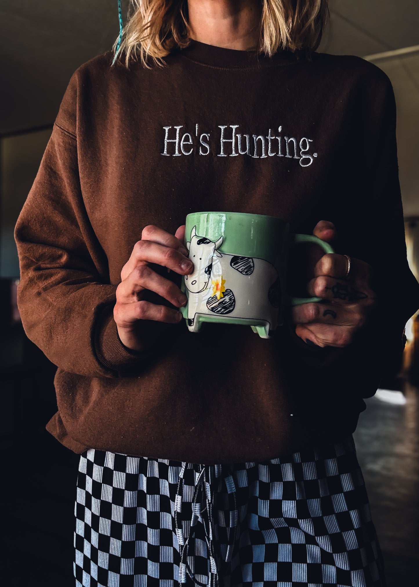 He’s Hunting, He's Working, He's Fishing Embroidered Sweatshirt