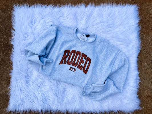 Leather Rodeo Embroidered Sweatshirt – Western Flair with Faux Leather Detail